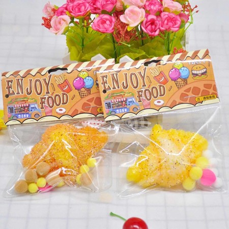Jucarie Antistres Squishy, Flippy, cu Revenire Lenta, Model Croissant, 10x8 cm, 90g, Ambalaj Transparent, Maro