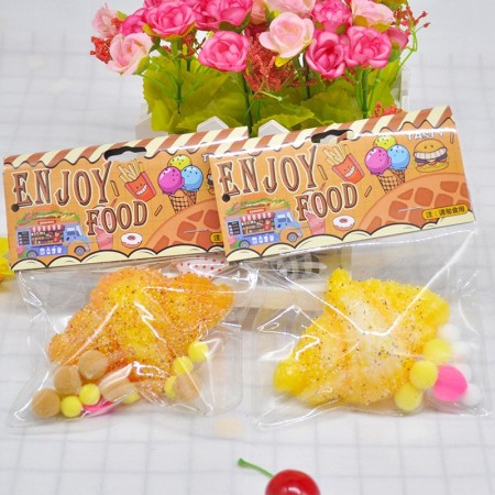 Jucarie Antistres Squishy, Flippy, cu Revenire Lenta, Model Croissant, 10x8 cm, 90g, Ambalaj Transparent, Maro