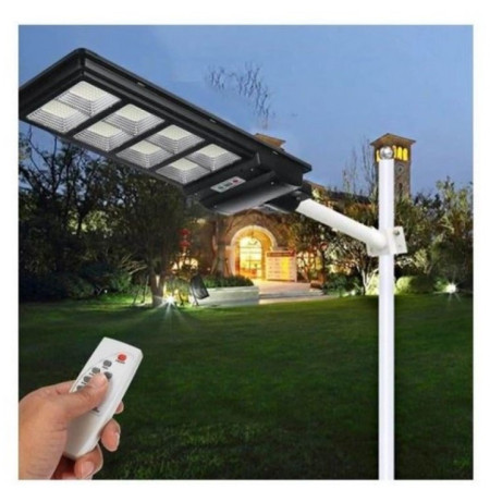 Lampa solara stradala Flippy, cu telecomanda, senzor de miscare si lumina, suport prindere, 180 LED-uri, IP65, ABS, 10AH, 200W, temperatura culoare 6500K, 59.5x23.8x6.8 cm, autonomie 10-12 ore, negru