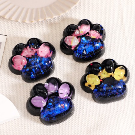 Jucarie Antistres Squishy, Flippy, cu Revenire Lenta, Model Cat Paw, 6.5 x 6 cm, din Tpr, 4-6 Ani, Model 5 Meduze, Negru cu Insertii