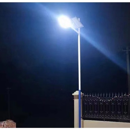 Lampa solara stradala Flippy, pentru curte sau strada, cu doua grile, finisaj mat, rezistent la apa, montare prin fixare, senzor lumina, baterie de litiu, IP65, lumina rece, putere 300W, autonomie 10 ore, 51.5 x 21 cm, gri