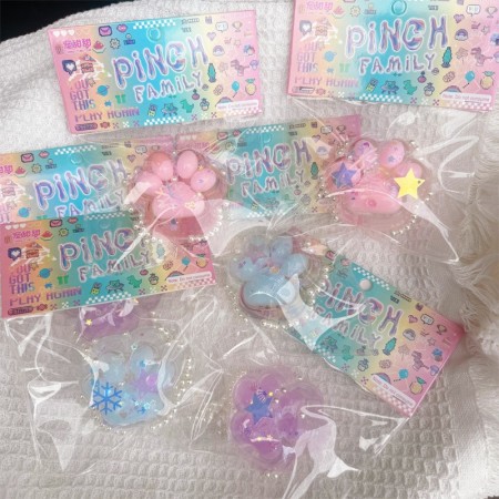 Jucarie Antistres Squishy, Flippy, cu Revenire Lenta, Model Labuta de Pisica, 6x5.5 cm, 70g, Ambalaj Transparent, Roz-Transparent