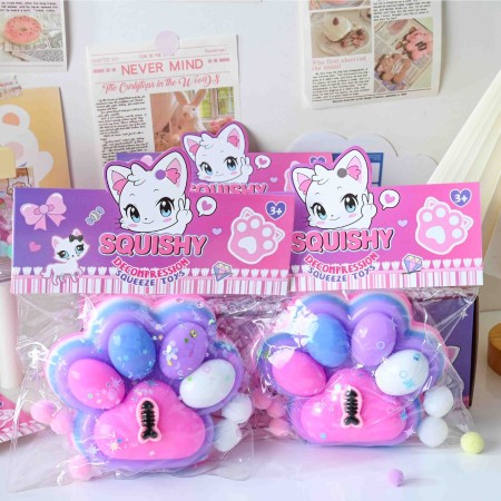Jucarie Antistres Squishy, Flippy, cu Revenire Lenta, Model Labuta de Pisica, cu Pestisor, 220g, 12.5 x 10.5 cm Squeeze Pinch Family, Ambalaj Transparent, Roz-Multicolor