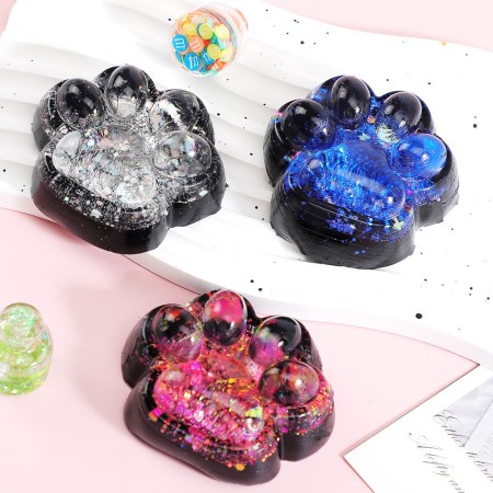 Jucarie Antistres Squishy, Flippy, cu Revenire Lenta, Model Labuta de Pisica cu Sclipici, 6.5x6 cm, 60g, Ambalaj Transparent, Albastru-Negru