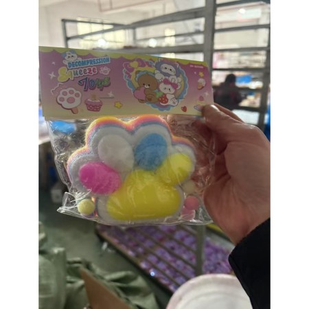 Jucarie Antistres Squishy, Flippy, cu Revenire Lenta, Model Labuta de Pisica Pufoasa, 220g, 12.5 x 10.5 cm Squeeze Pinch Family, Ambalaj Transparent, Galben-Multicolor