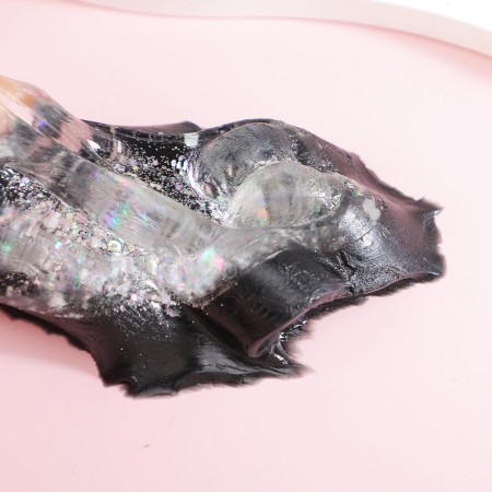 Jucarie Antistres Squishy, Flippy, cu Revenire Lenta, Model Labuta de Pisica cu Sclipici, 6.5x6 cm, 60g, Ambalaj Transparent, Alb-Negru