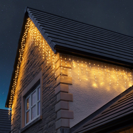 Instalatie Craciun Tip Franjuri/Turturi, lungime 12 m, 300 LED-uri, Prelungitor 1.5 m, Conectare la Retea, Fir transparent, Alb Cald