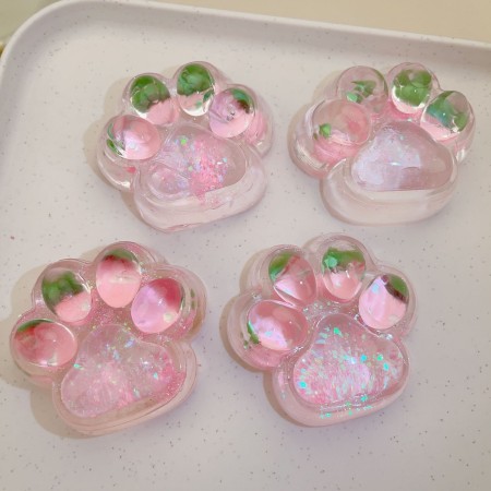 Jucarie Antistres Squishy, Flippy, cu Revenire Lenta, Model Labuta de Pisica cu Sclipici, 6.5x6 cm, 60g, Ambalaj Transparent, Roz