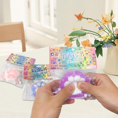 Jucarie Antistres Squishy, Flippy, cu Revenire Lenta, Model Labuta de Pisica Pufoasa, 6x6 cm, 72g, Ambalaj Transparent, Mov-Alb