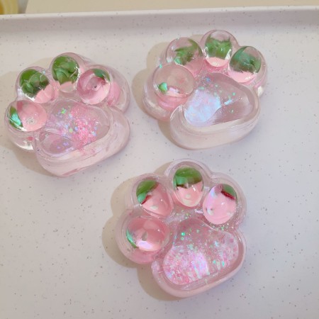 Jucarie Antistres Squishy, Flippy, cu Revenire Lenta, Model Labuta de Pisica cu Sclipici, 6.5x6 cm, 60g, Ambalaj Transparent, Roz